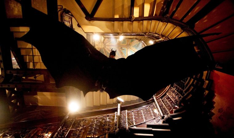 Batman Begins - Full shot from below of Christian Bale as Batman with wings spread. Batman Begins Film still Image from pxl.sky.com