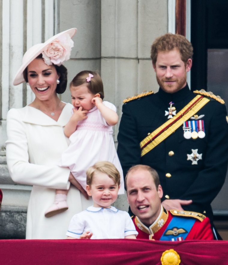 LONDON, ENGLAND - JUNE 11: Catherine, Duchess of Cambridge, Princess Charlotte, Prince George, Prince Harry, Prince William, Duke of Cambridge stand on the balcony during the Trooping the Colour, this year marking the Queen's official 90th birthday at The Mall on June 11, 2016 in London, England. The ceremony is Queen Elizabeth II's annual birthday parade and dates back to the time of Charles II in the 17th Century when the Colours of a regiment were used as a rallying point in battle. (Photo by Samir Hussein/WireImage)