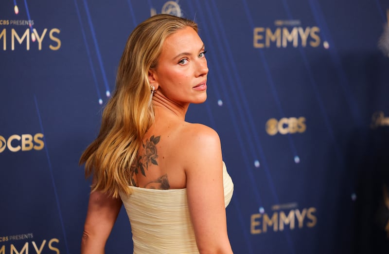 Scarlett Johansson poses on the red carpet at the 77th Primetime Emmy Awards in 2025.