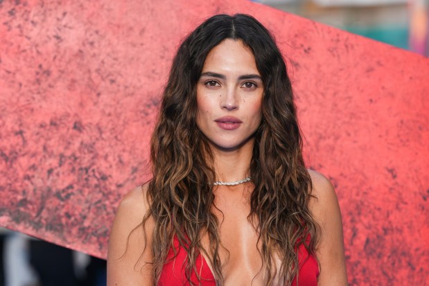 Adria Arjona poses for photographers upon arrival at a fan event for the film 'Supergirl' in mid-June in London. She will appear at San Diego Comic-Con on Thursday. (Photo by Scott A Garfitt//Invision/AP)