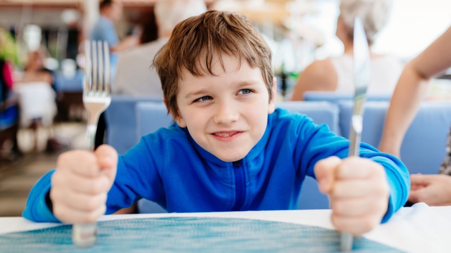little boy at a restaurant