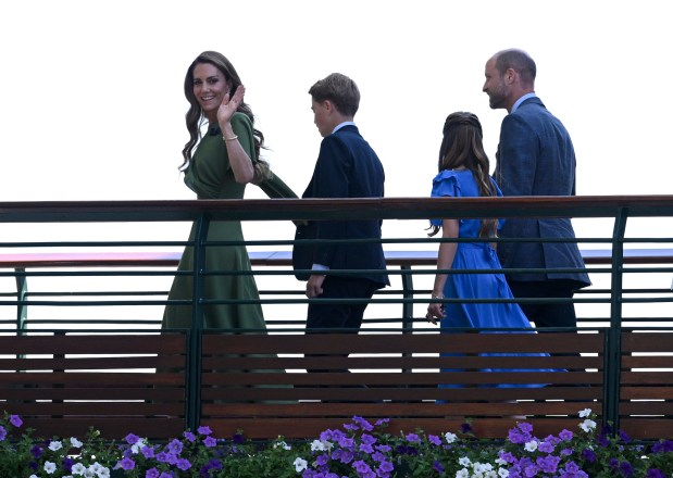 LONDON, ENGLAND - JULY 12: Catherine, Princess of Wales, Prince George, Princess Charlotte and Prince William, Prince of Wales, make their way to Center Court for the Gentlemen's Singles final match between Jannik Sinner of Italy and Alexander Zverev of Germany on day fourteen of The Championships Wimbledon 2026 at All England Lawn Tennis and Croquet Club on July 12, 2026 in London, England. (Photo by Matthias Hangst/Getty Images)