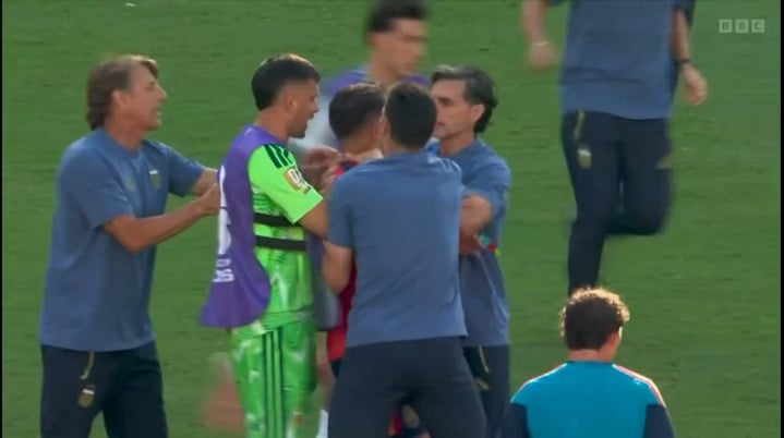 Argentina's Leandro Paredes seen attacking Spanish players after the World Cup final game was over