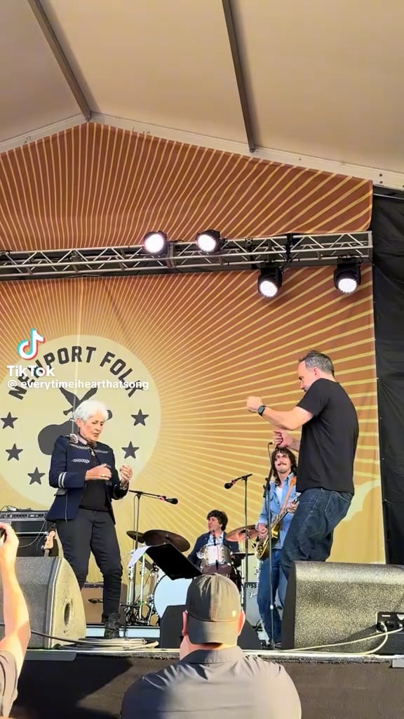 Joan Baez (who is 85) showing her impressive dance moves with Dave Matthews at Newport folk festival.