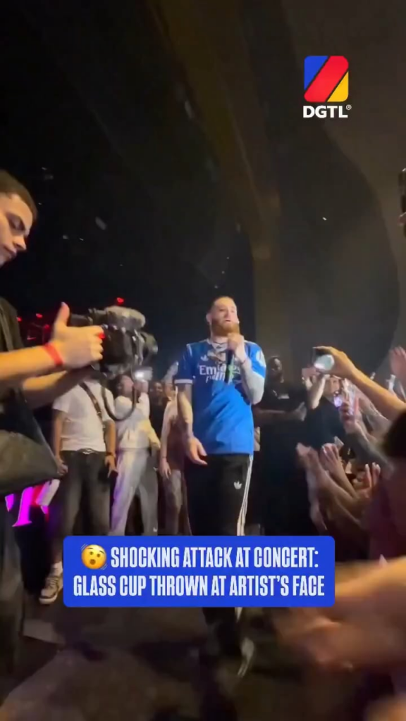 Audience member throws a glass cup at Puerto Rican reggaeton artist Hades66 that shattered on his face in the middle of a performance