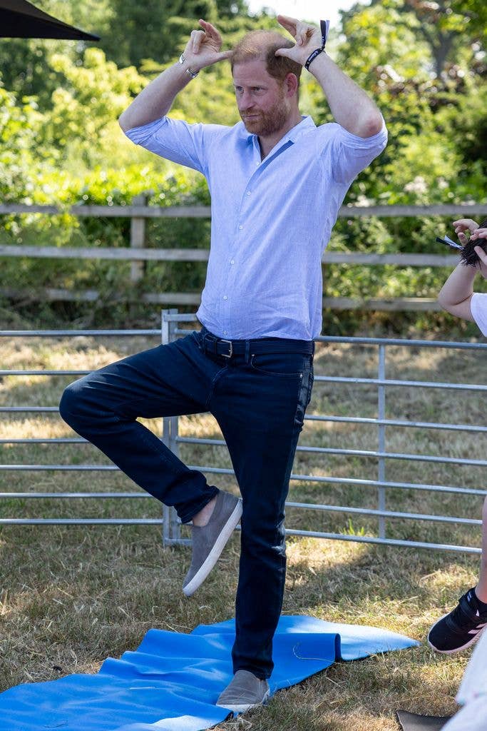 harry doing yoga pose