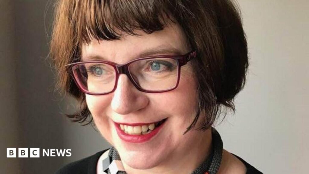 Cornwall musician’s love of music set to endure through gift A woman with a brown bob is looking off to the side with a lovely smile. She is wearing glasses.