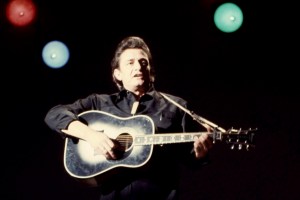 American country singer Johnny Cash (1932 - 2003) sings and plays his guitar on stage during The Johnny Cash Show in Tucson, Arizona, April 15, 1970. (Photo by Oscar Abolafia/TPLP/Getty Images)
