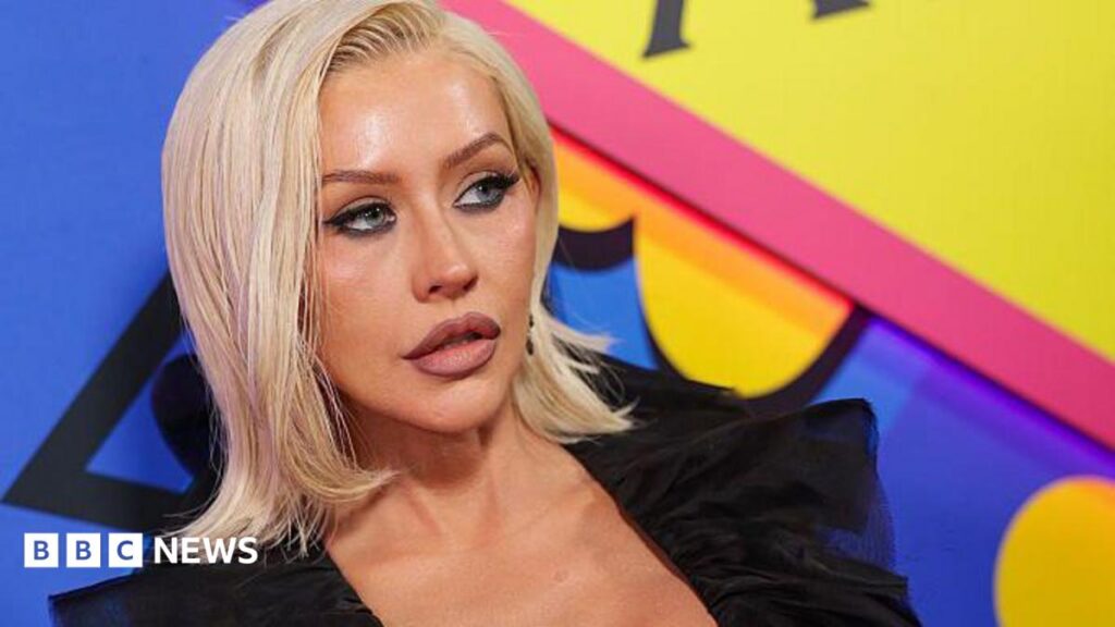 Weekly round-up: Five stories from the south you may have missed Christina Aguilera at The Abbey 35th Anniversary Party held at The Abbey on May 20, 2026 in Los Angeles, California. She is wearing a black top and has shoulder length blonde hair. Christina is standing in front of a brightly coloured blue, yellow and pink backdrop.