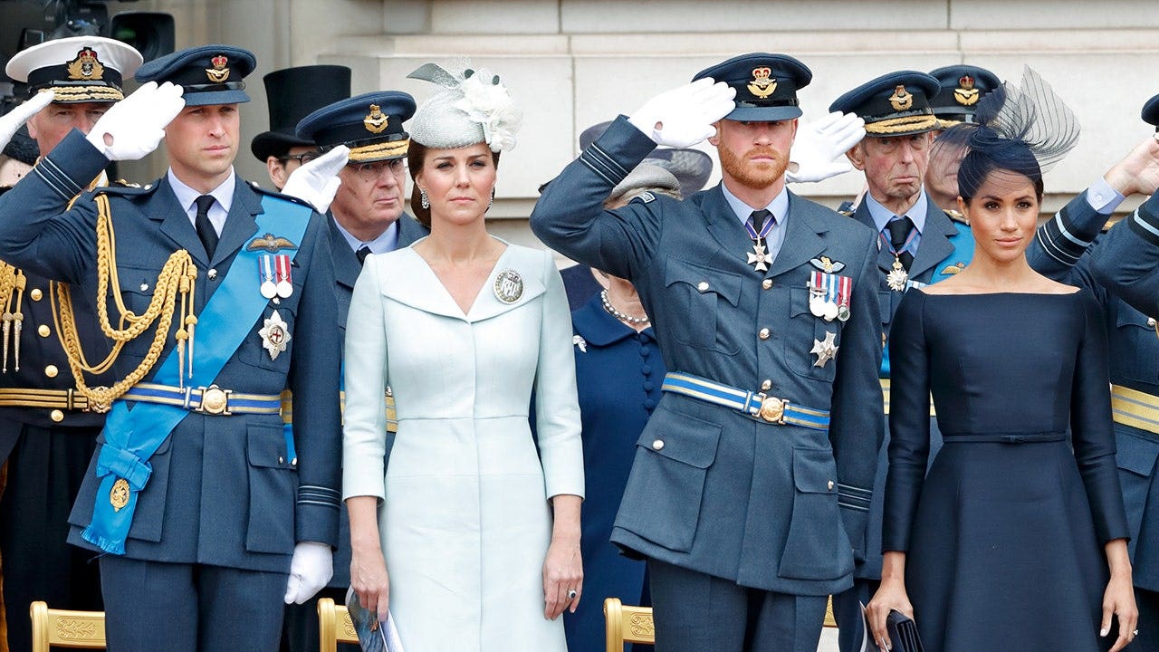 Prince William, Kate Middleton, Prince Harry and Meghan Markle standing together in formal wear honoring the Royal Air Force.