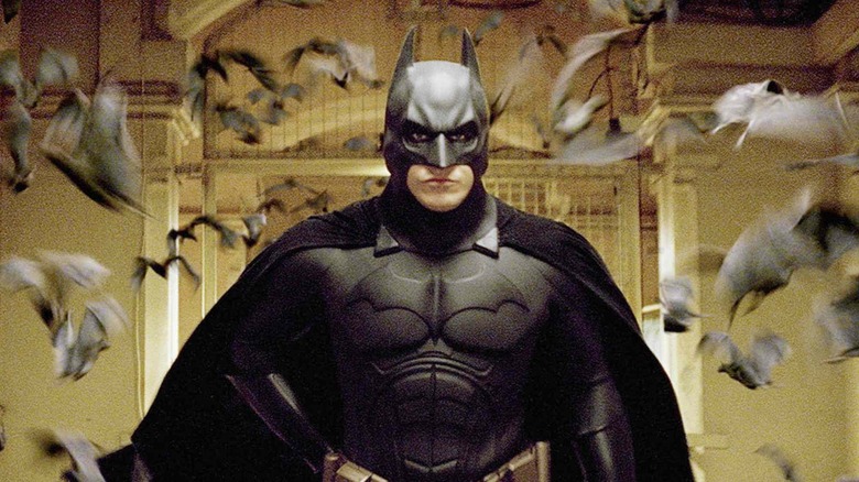 Batman surrounded by actual bats in Batman Begins