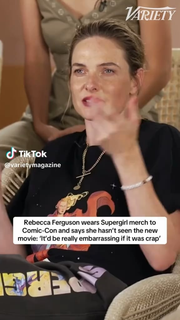 Rebecca Ferguson wears Supergirl merch to Comic-Con and says she hasn't seen the new movie: "It'd be really embarrassing if it was crap"
