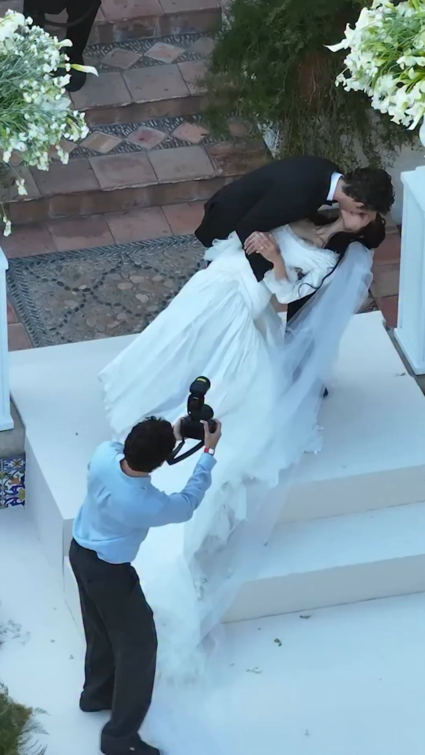 Just married! The 1975 frontman Matty Healy and model Gabriette Bechtel said “I do” on Saturday in a romantic sunset ceremony at Madonna’s former Hollywood Hills estate beneath the iconic Hollywood sign | July 18, 2026