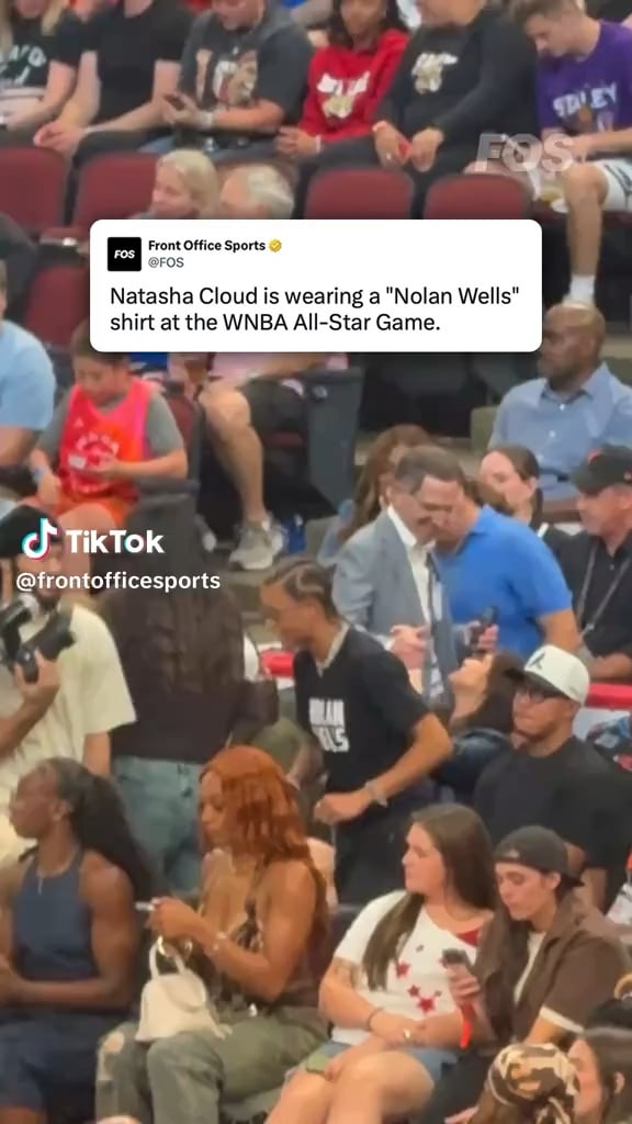 Natasha Cloud is wearing a Nolan Wells shirt at the WNBA All-Star Game.