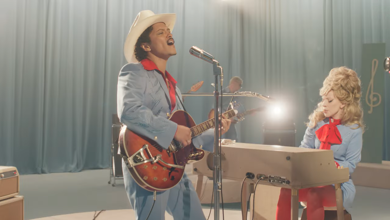 Lady Gaga and Bruno Mars in the music video for 