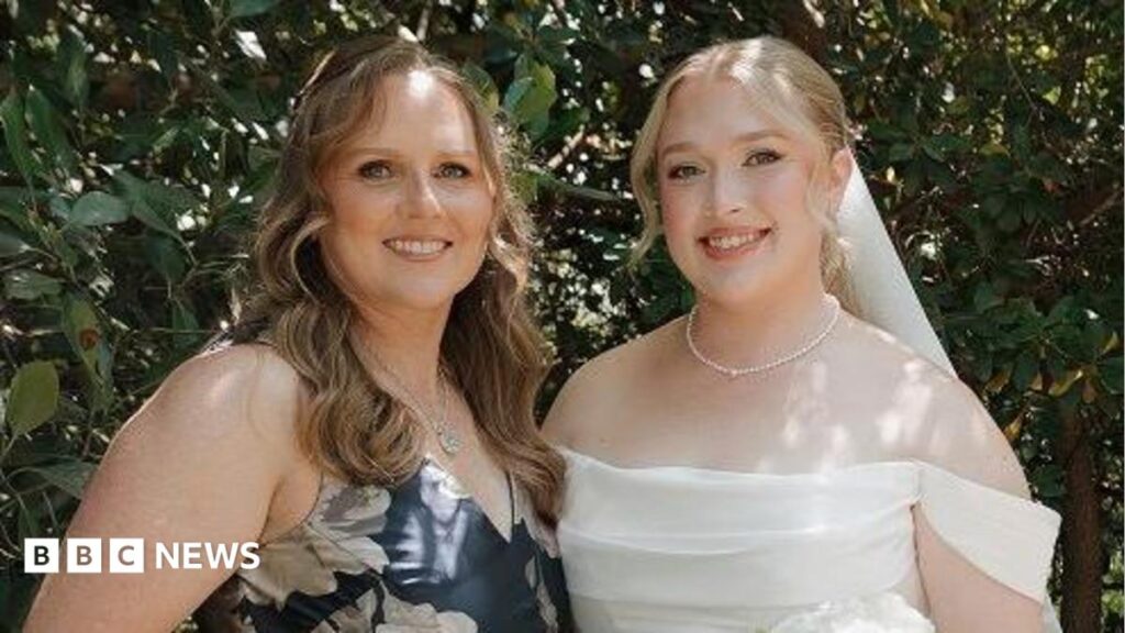 Brad Pitt’s children are dropping their dad’s surname – here’s why I did the same Hannah and her mother at Hannah's wedding. Her mother is wearing a blue dress with white flowers. Hannah on the right is dressed in a white wedding dress holding a bouquet