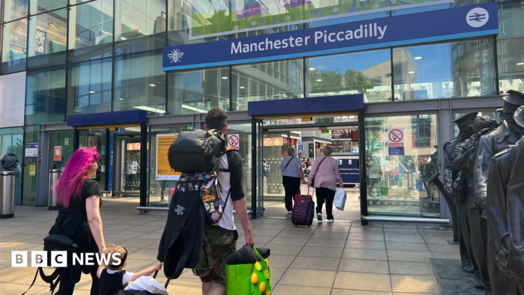 Manchester PiccadillyRail strike planned over ‘unfair sacking’ A care worker helps a woman down a flight of stairs