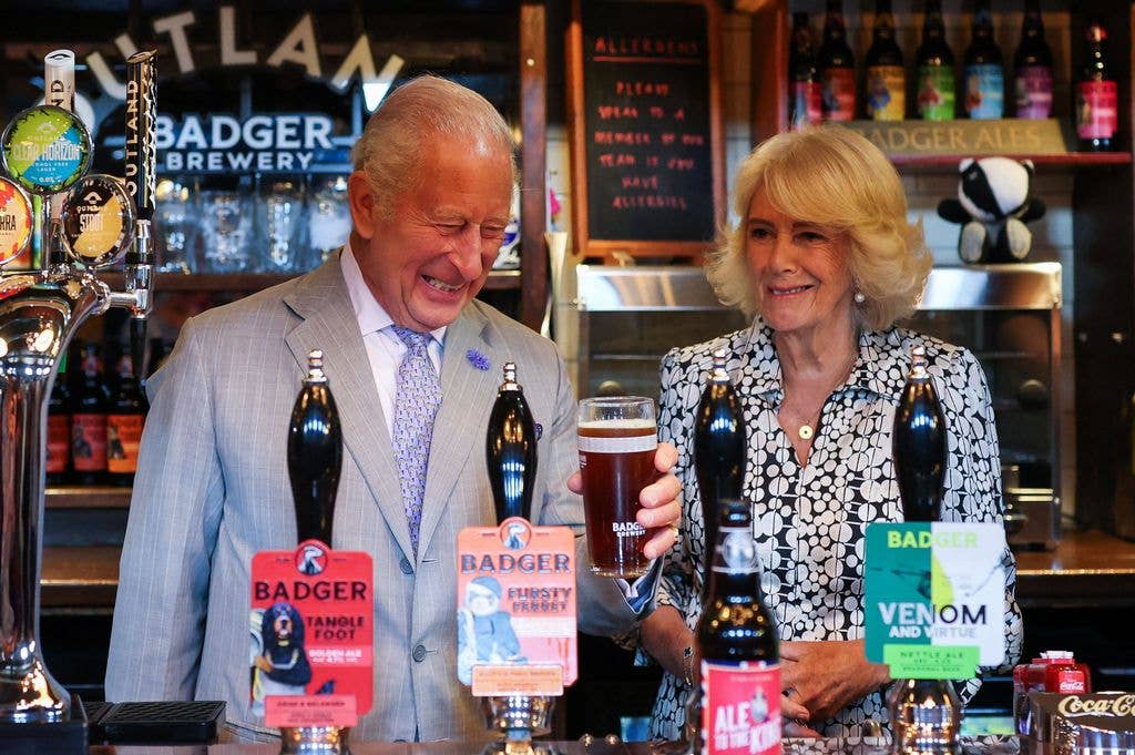 Charles made the joke as he poured pints with Camilla