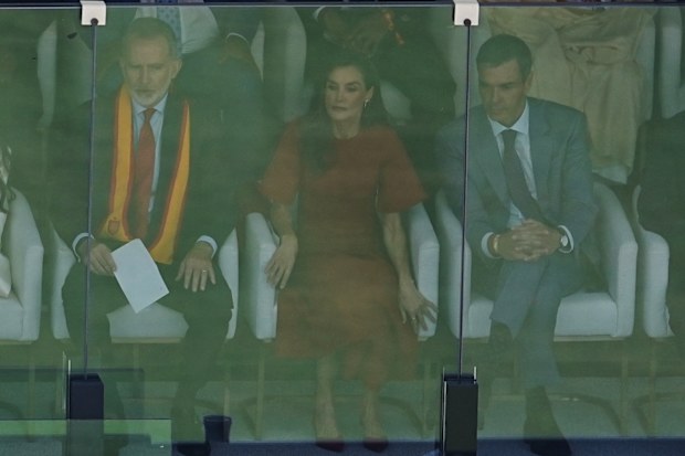 Spain’s King Felipe VI, Queen Letizia, and Spainish Prime Minister Pedro Sanchez watch the World Cup final soccer match between Spain and Argentina.