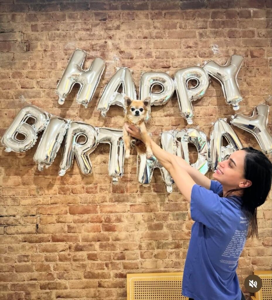 Melissa Barrera posts happy birthday to her dog “My firstborn turns 14 today and so here are 14 slides of this perfect angel being perfect and making every single day better and brighter, my lil grinch.”