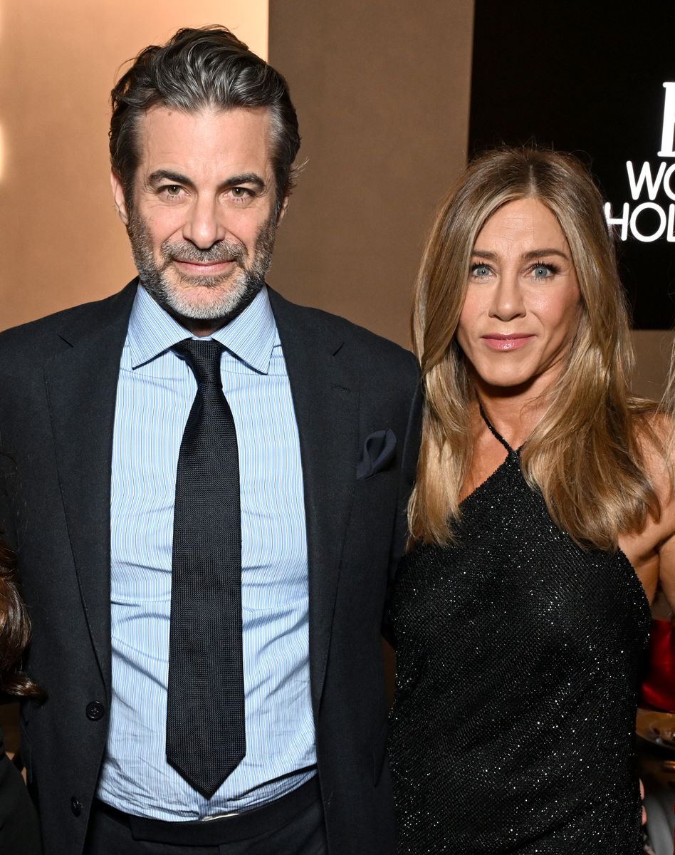 LOS ANGELES, CALIFORNIA - NOVEMBER 17: (L-R) Jim Curtis and Jennifer Aniston, wearing Ralph Lauren, attend ELLE's 2025 Women in Hollywood Celebration presented by Ralph Lauren and Bvlgari with support from evian, Hendrick's Gin, and Lucid Motors on November 17, 2025 in Los Angeles, California. (Photo by Michael Kovac/Getty Images for ELLE) 