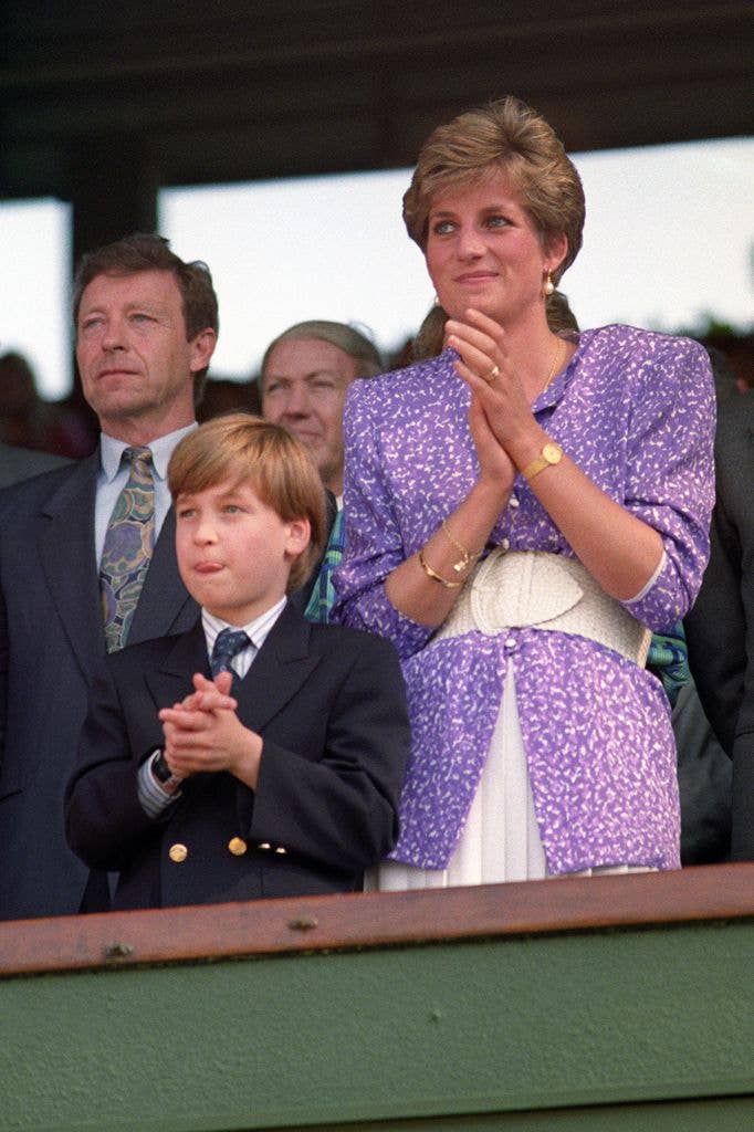 Diana, Princess of Wales and Prince William stand and applaud in the Royal Box on Centre Court at Wimbledon, as Steffi Graf wins the Women's Singles Championship.  