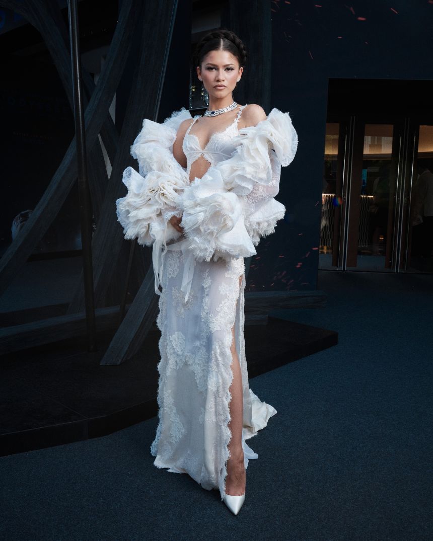 The actor's two-tone white gown took over 800 hours to create according to Louis Vuitton.