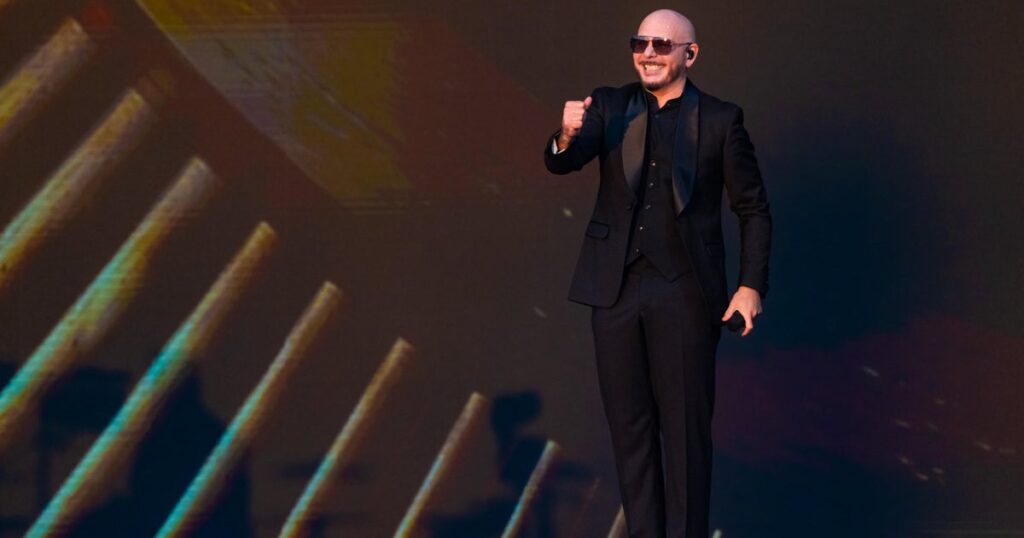 Pitbull sets Guinness World Record for largest gathering of people wearing bald caps Pitbull sets Guinness World Record for largest gathering of people wearing bald caps