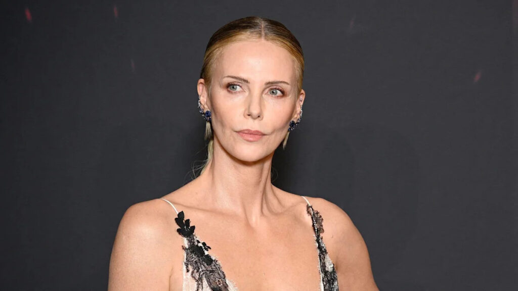 Charlize Theron, 50, stuns in plunging lace gown on red carpet Charlize Theron, 50, stuns in plunging lace gown on red carpet