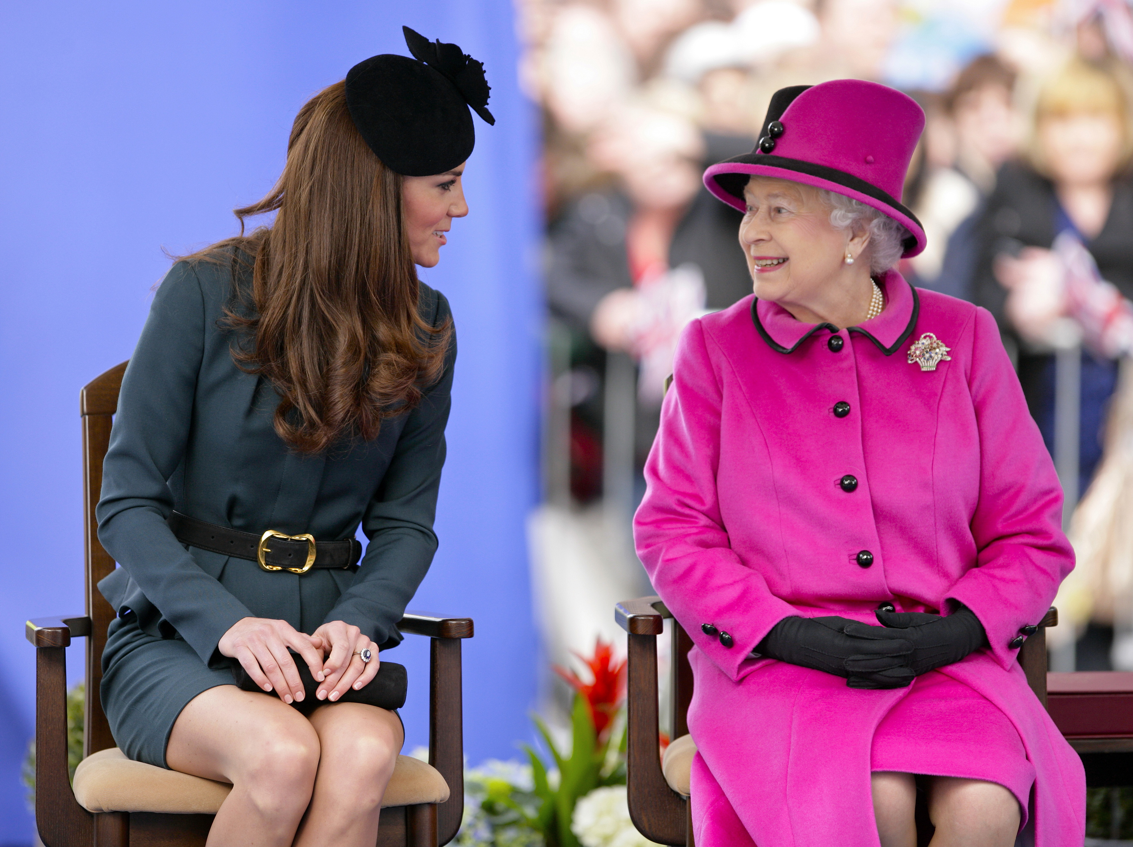 Catherine, Duchess of Cambridge and Queen Elizabeth II listen to a speech on March 8, 2012 in Leicester, England. (Photo by Indigo/Getty Images)