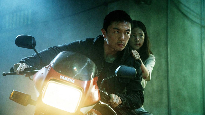Wang Wei and his daughter looking cool as hell on a motorcycle in The Furious (2026)