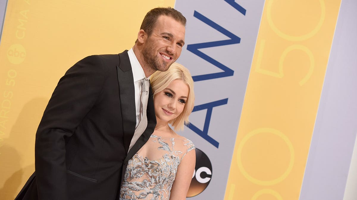 Josh Davis and Raelynn attend an awards event in Nashville.