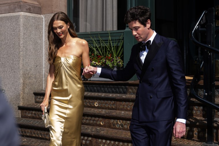 Karlie Kloss and Joshua Kushner are seen heading to the wedding of Taylor Swift and Travis Kelce