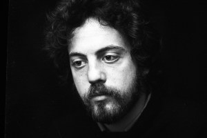 Billy Joel posed in Amsterdam, Netherlands, 1976. (Photo by Gijsbert Hanekroot/Redferns)