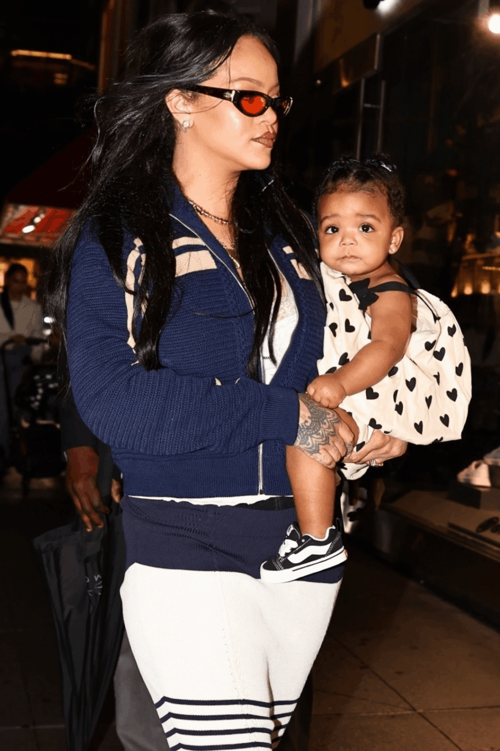 Rihanna with her daughter Rocki in NYC last night