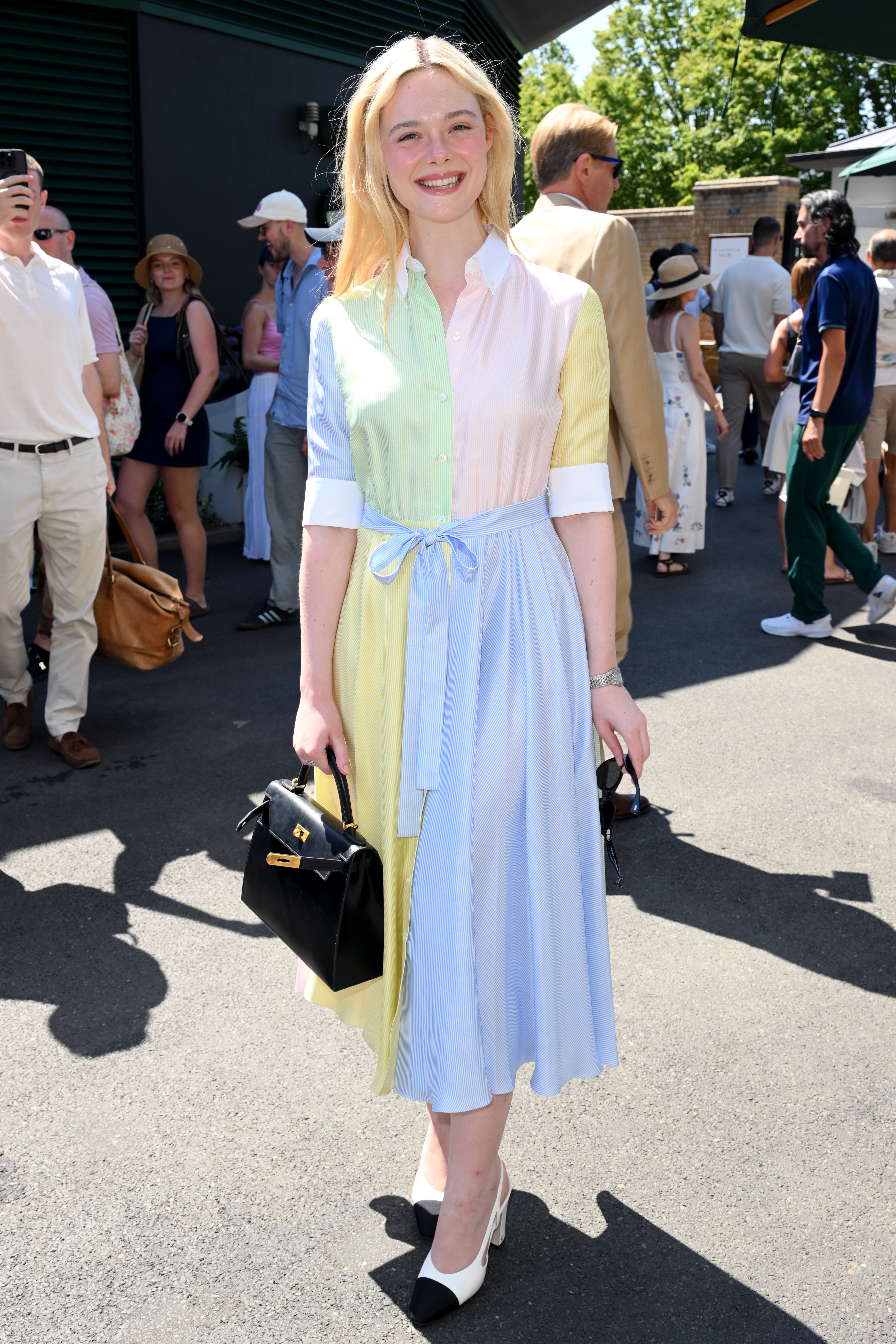 Elle Fanning attended Wimbledon 2026 in a Dior shirtdress, Chanel shoes, and a Herm&egrave;s Kelly bag July 8