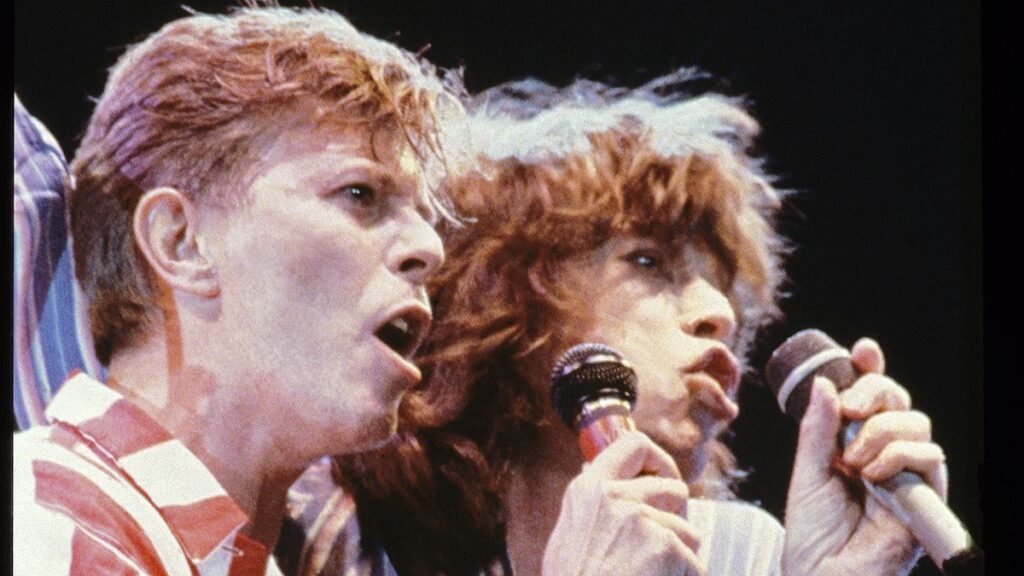 “I said, ‘God, you’ve nicked all my things.’ He said, ‘Yeah, I know, man. I know. It’s like a homage to you’”: David Bowie admitted that he stole the Stones’ sound on one classic song, says Mick Jagger LONDON - JUNE 20: David Bowie and Mick Jagger performing on stage at The Prince's Trust 10th Birthday Party at Wembley Arena, London, United Kingdom on 20th June 1986. (Photo by Brian Cooke/Redferns)