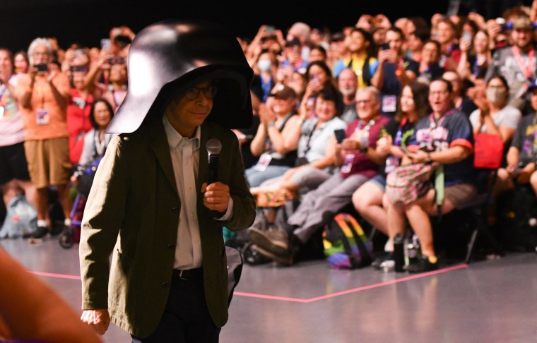 Rick Moranis walks through the crowd as Lord Dark Helmet.