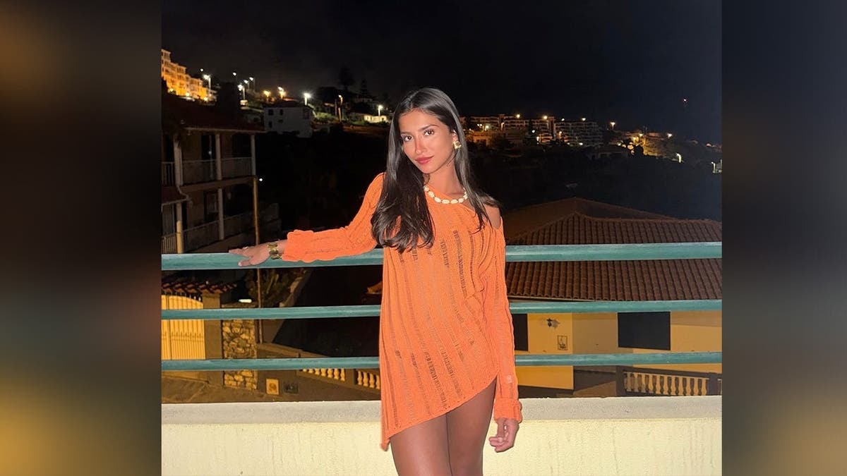 image shows victim in orange dress