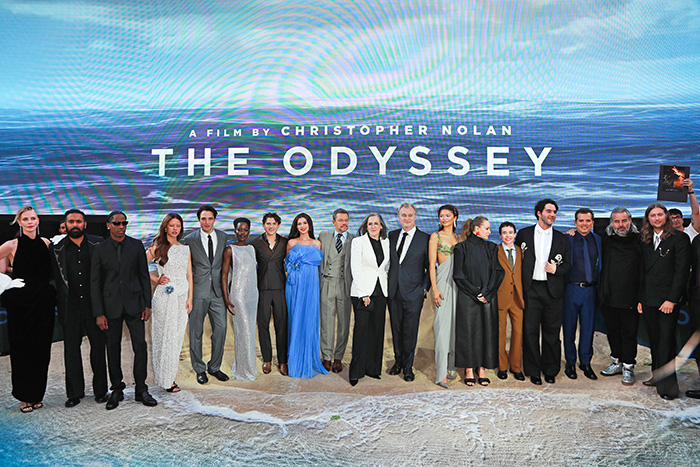 Zendaya's latest look among a large group of people at a film event for THE ODYSSEY, with a tiny detail.