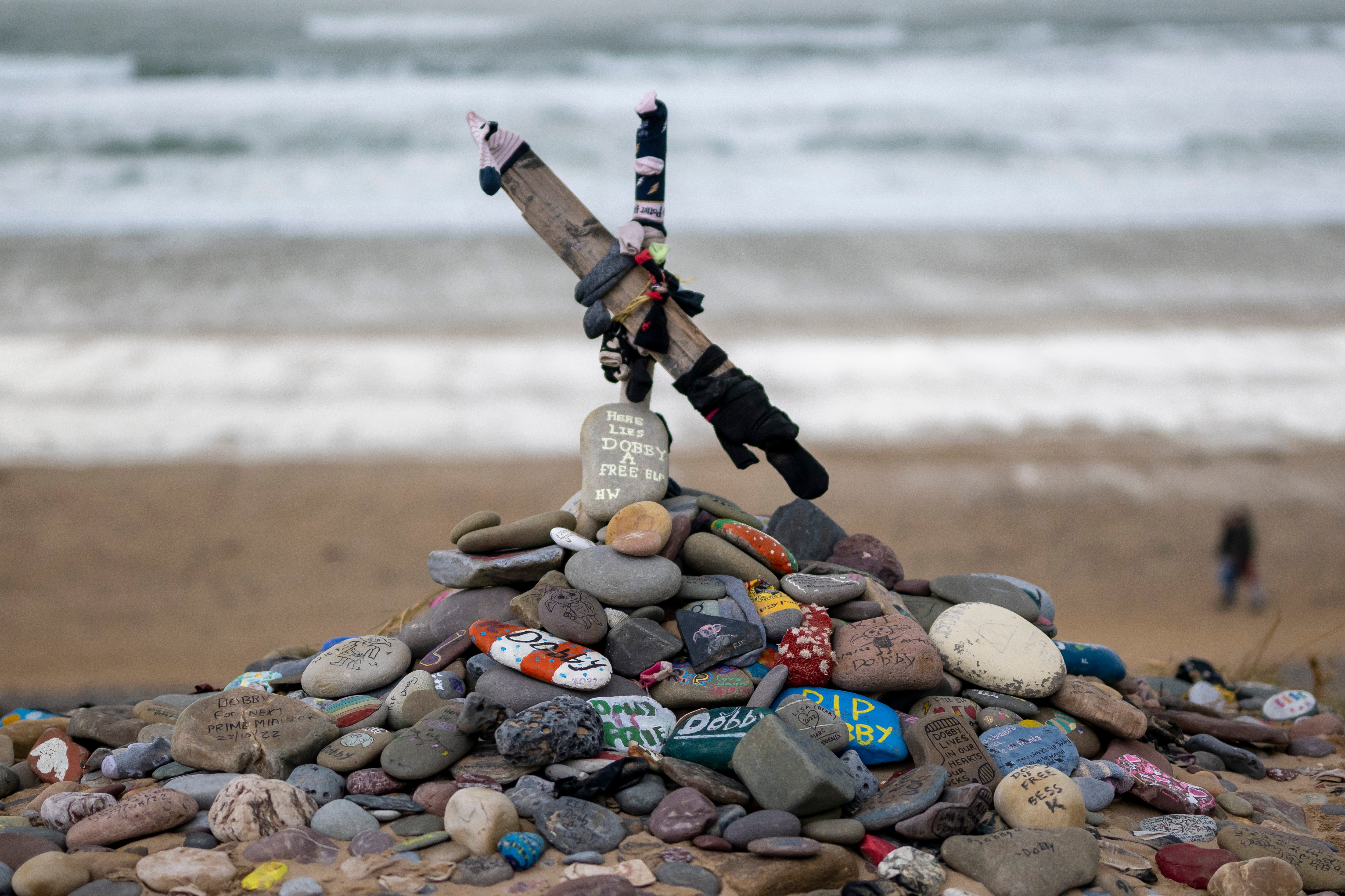 A memorial for Dobby, a fictional house elf from the Harry Potter fantasy novels and films, at Freshwater West beach