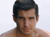 George Hamilton in a bare-chested portrait circa 1964.
