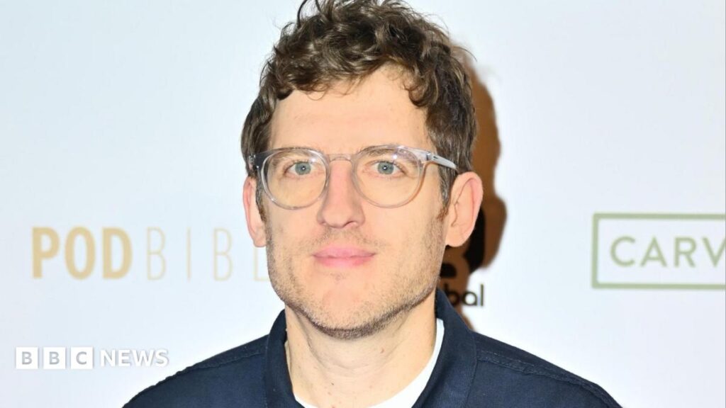 Elis James says global fame of The Cymru Connection is ‘bonkers’ Two police men arresting a woman on the ground. Her face is blurred.