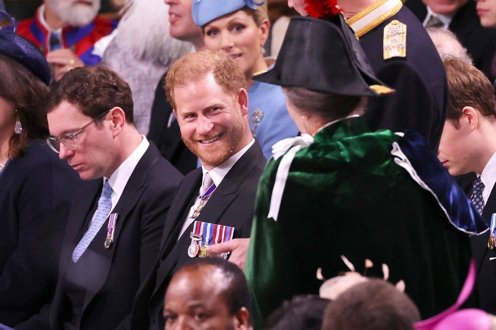Prince Harry, Duke of Sussex speaks to Princess Anne, Princess Royal during the Coronation of King Charles III and Queen Camilla at Westminster Abbey on May 6, 2023 in London, England. 