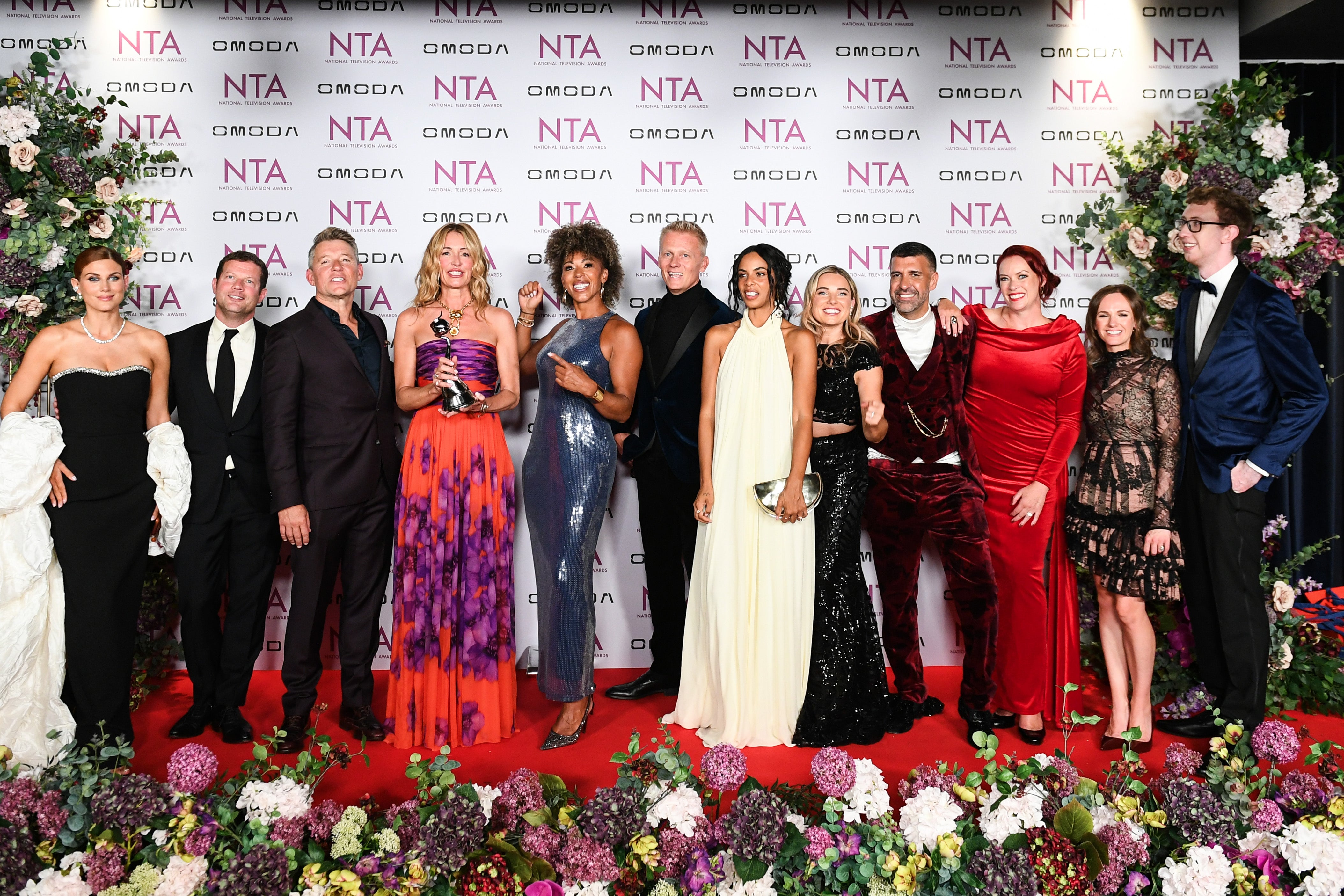Ashley James, Dermot O'Leary, Ben Shephard, Cat Deeley, Dr Zoe Williams, Dr Scott Miller, Rochelle Humes, Sian Welby, Dan Hatfield, Sharon Marshall, Grace Forrell and Jordon Cox pose with the 'Daytime' award in the Winners Room at the National Television Awards 2026