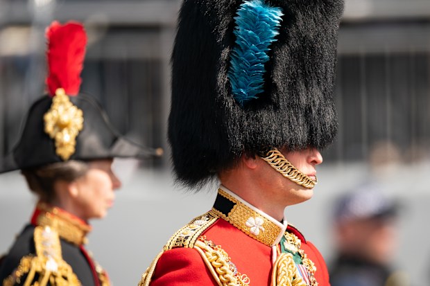 LONDON, ENGLAND - JUNE 02: Prince William, Duke of Cambridge, in his role as Colonel of the Irish Guards, rides his horse along the Mall during the Royal Procession ahead of the Trooping the Colour parade on June 2, 2022 in London, England. Trooping The Colour, also known as The Queen's Birthday Parade, is a military ceremony performed by regiments of the British Army that has taken place since the mid-17th century. It marks the official birthday of the British Sovereign. This year, from June 2
