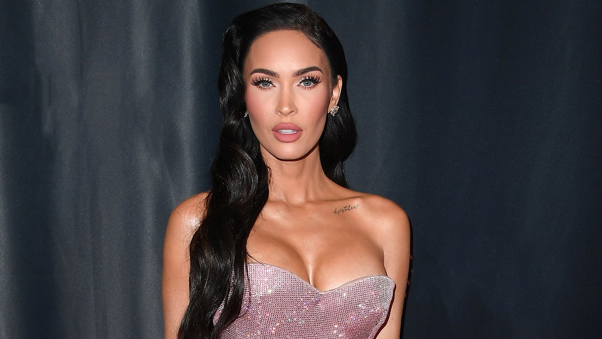 Megan Fox wears sparkling pink rhinestone dress to movie premiere